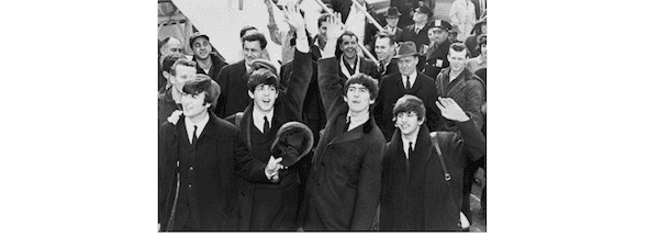 The Beatles Waiving to Fans